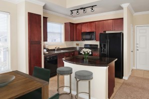 Kitchen with island at Camden Northpointe in Tomball, TX