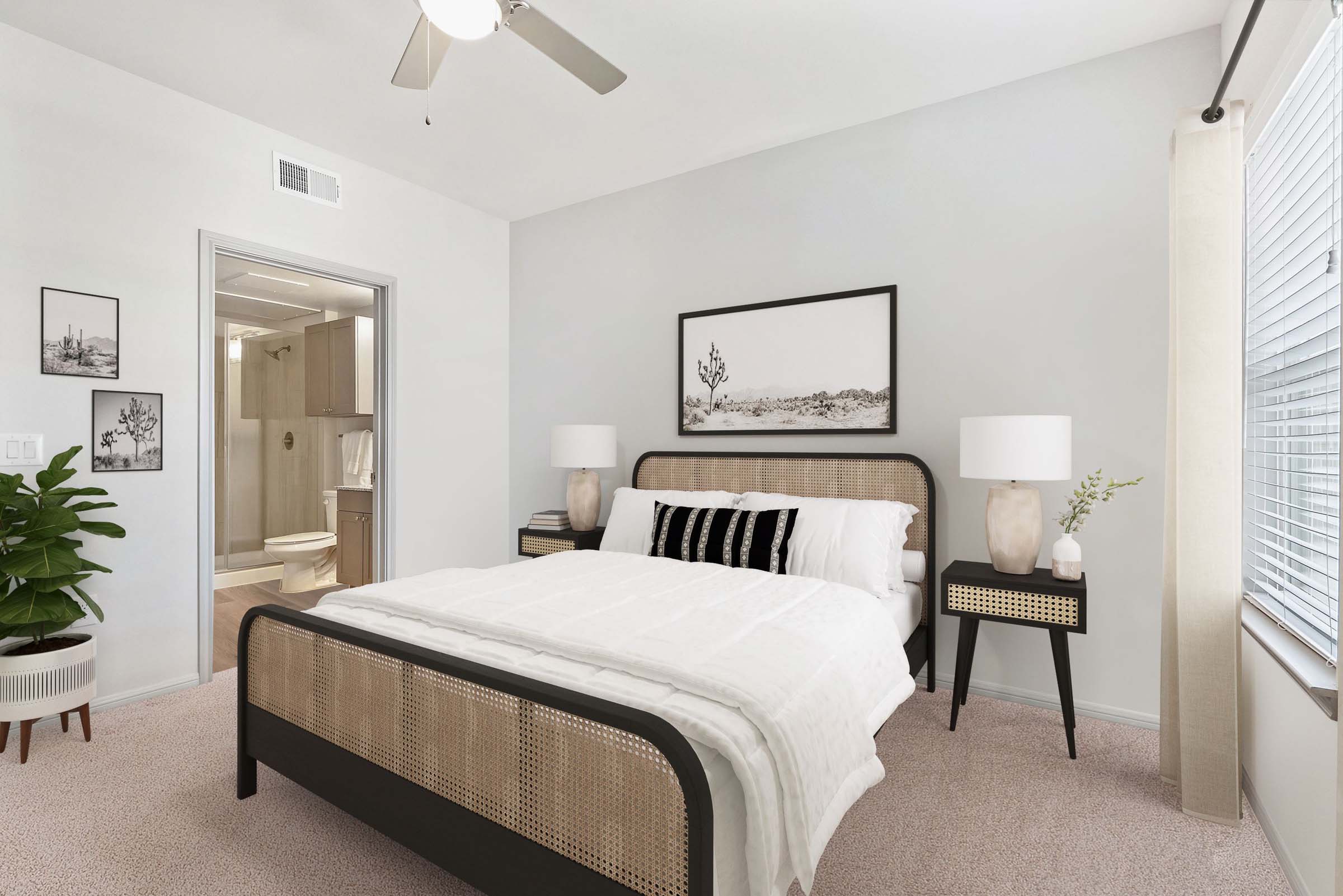 Bedroom with carpet and ensuite at Camden Leander apartments in Leander, Tx