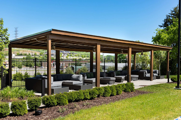 Cabana seating next to the sand volleyball court at Camden West Nashville apartments in Nashville, TN