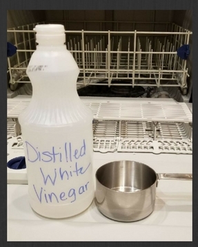 Clean your dishwasher by running an empty cycle with 1 cup distilled vinegar