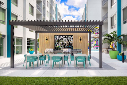 Poolside BBQ grills at Camden Thornton Park Apartments in Orlando, Florida