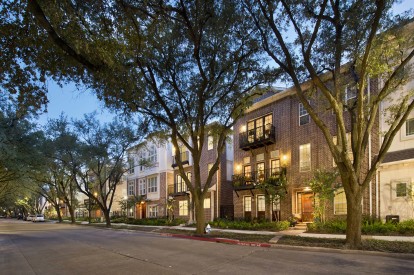 The townhomes building exterior at night