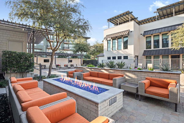 Villas side poolside firepit with seating at Camden Greenville