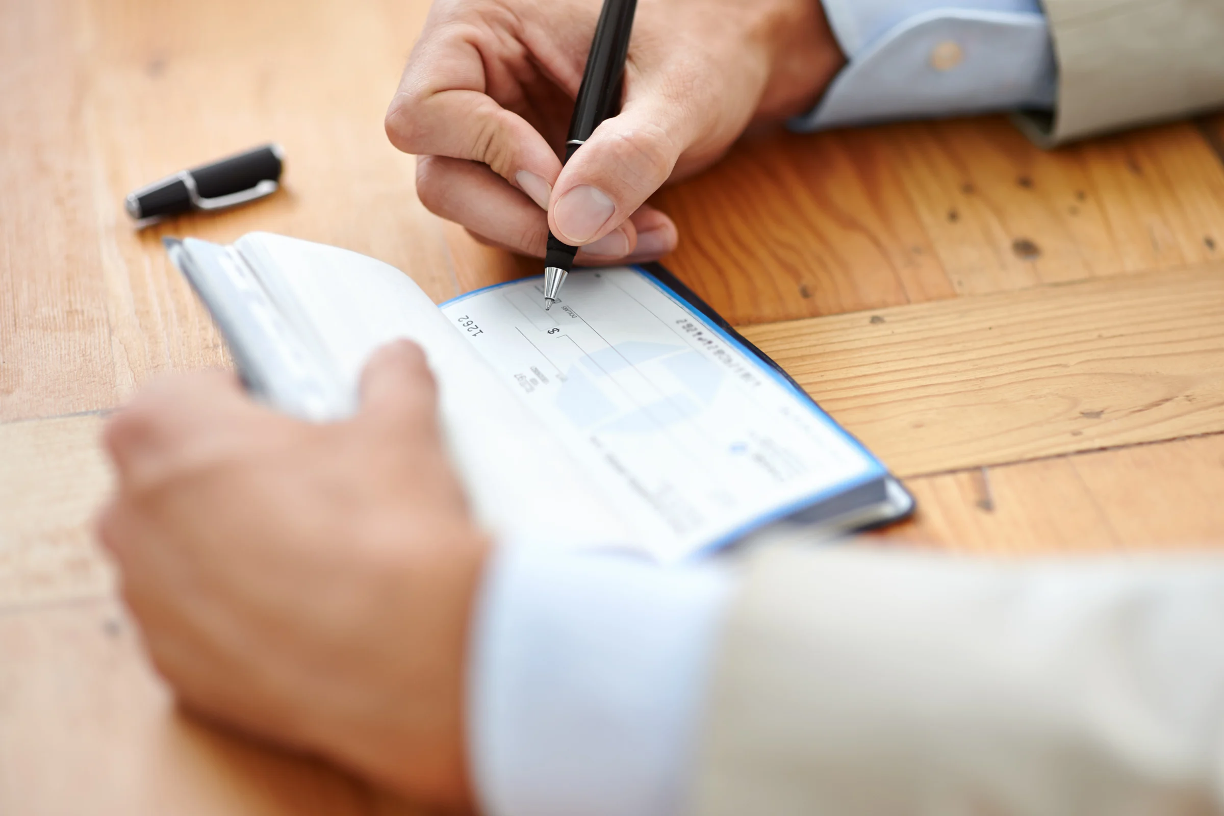 The Hidden Costs of Accepting Rent Via Paper Checks