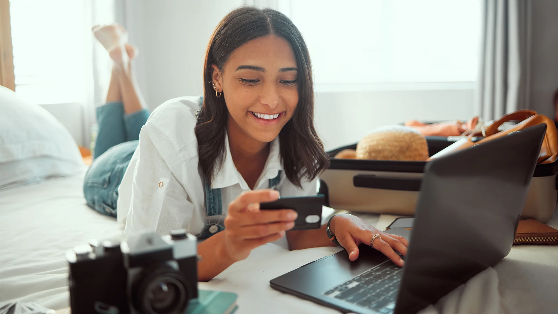 woman packing and making purchase online