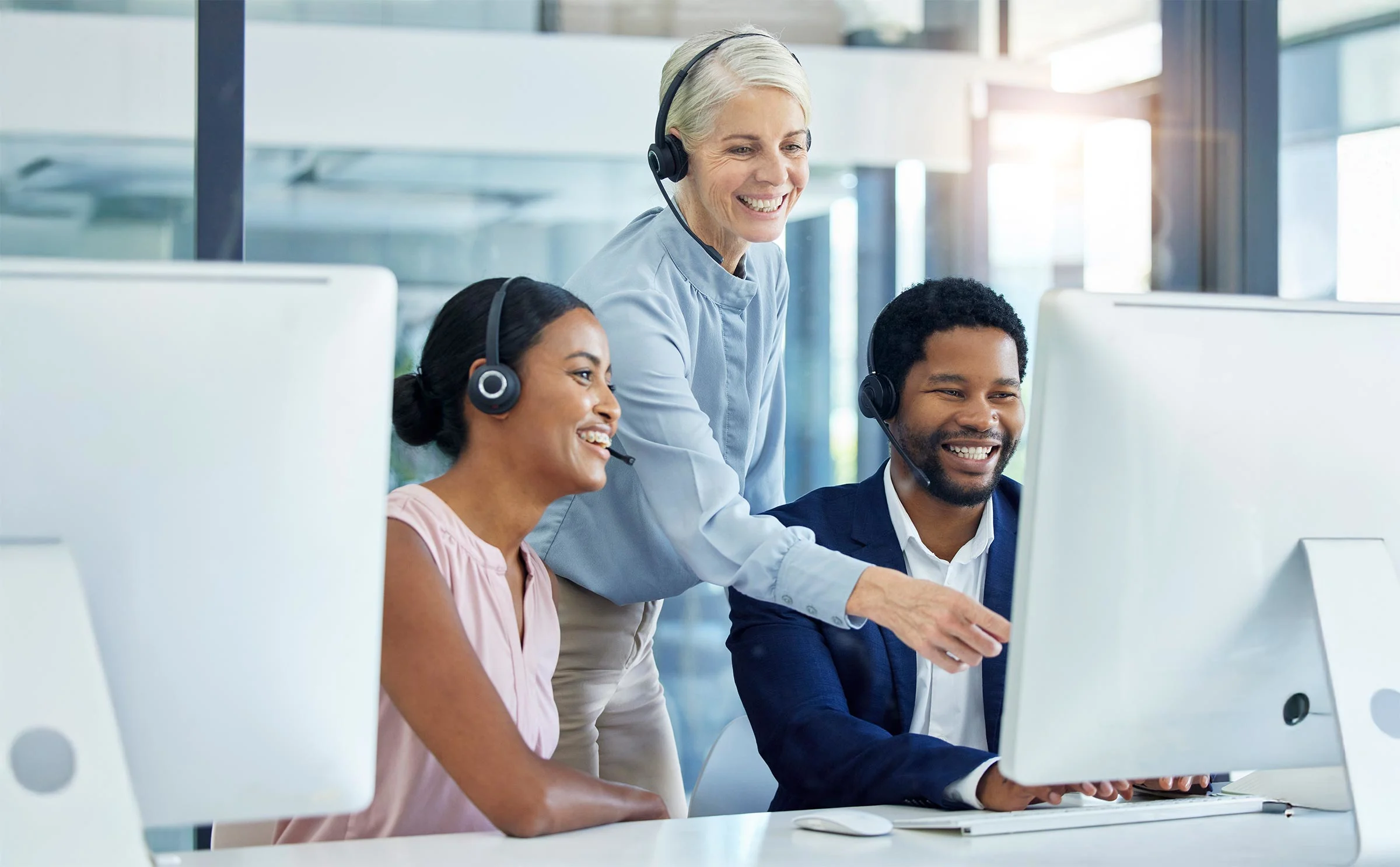 Call center, customer support and manager helping consultants with online consultation in office