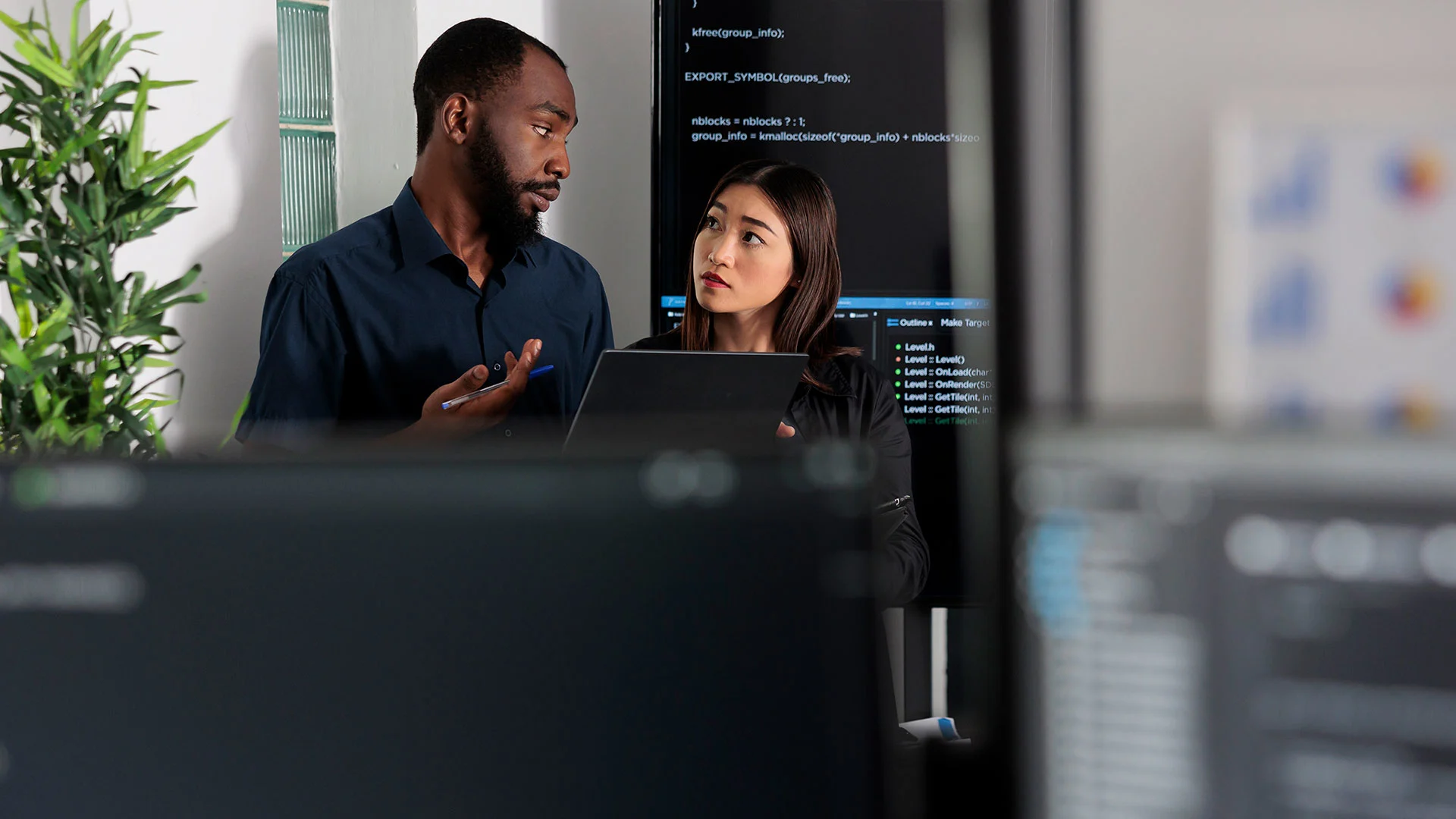 Diverse developers looking at integrations and artificial intelligence