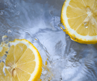 Fresh Perfumes_Photo by Tirza van Dijk on Unsplash_two slices of lemon floating in water