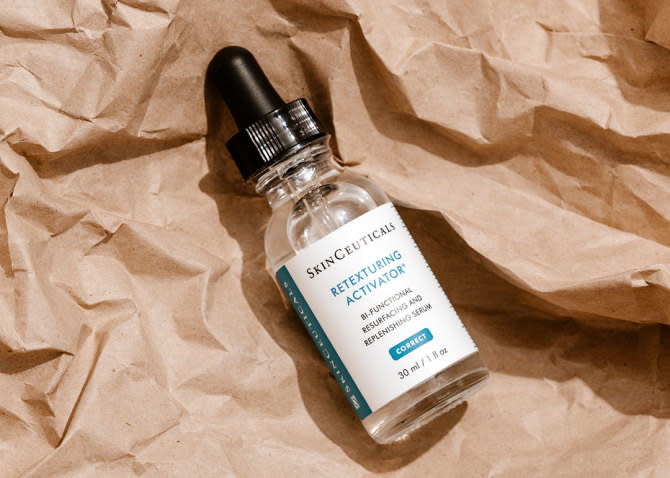 Skinceuticals Retexturizing Activator  - flat lay of product bottle brown on recycled paper - 670 x 478