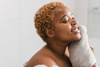 everything-you-need-to-know-about-baby-powder_Women drying herself with towel after showering_1080x800