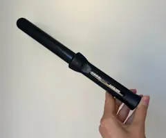 VIDEO: Curling hair with a curling iron: A beginners guide on bouncy, voluminous waves