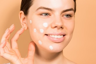 Dermalogica MediBacSebumClearingMasque - young woman with blemish spot treatments on her face - 1200 x 800