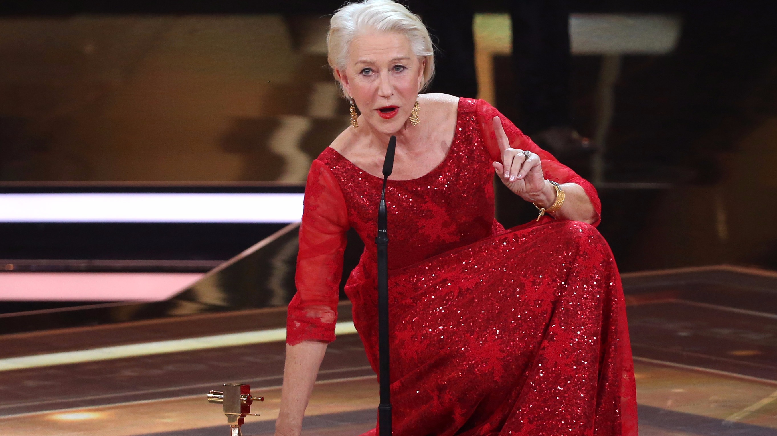 Helen Mirren improvises during awards acceptance speech as mic slips to