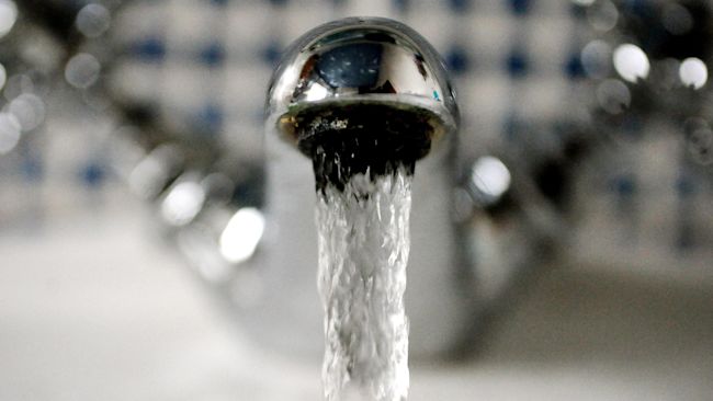 Water pouring from a tap