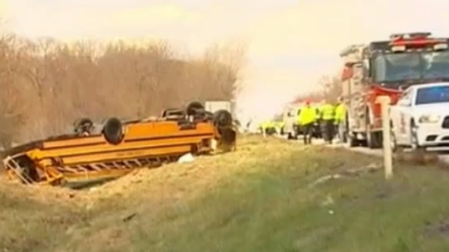 School bus overturns and rolls into ditch after being hit by car | ITV News