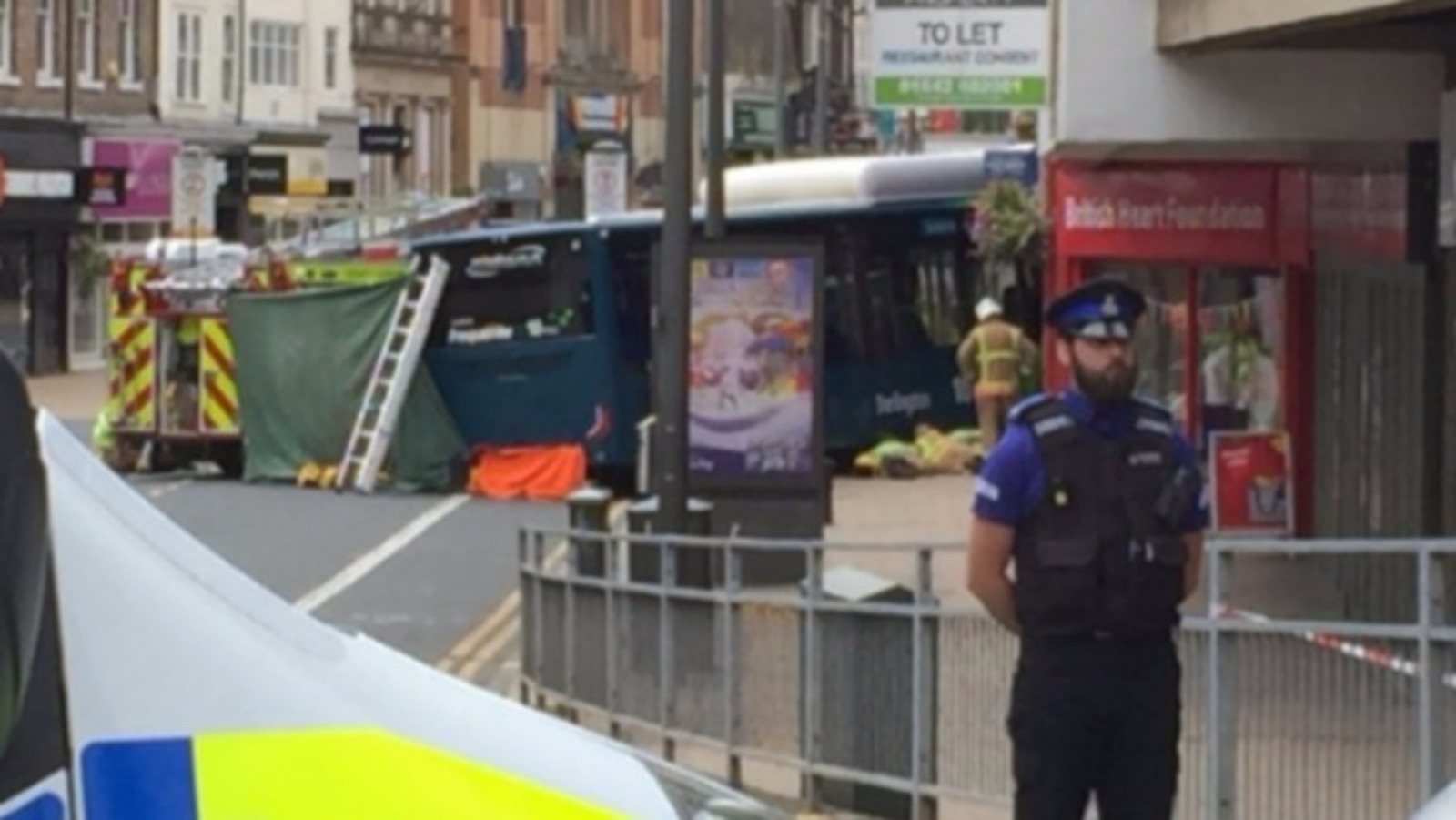 Elderly woman killed after being trapped under a bus is named | ITV News