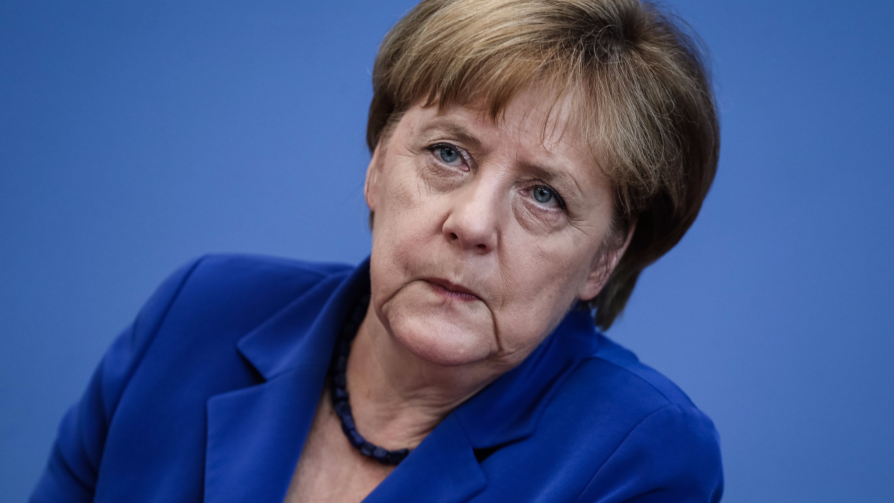 merkel-defends-open-door-refugee-policy-after-deadly-attacks-by-asylum