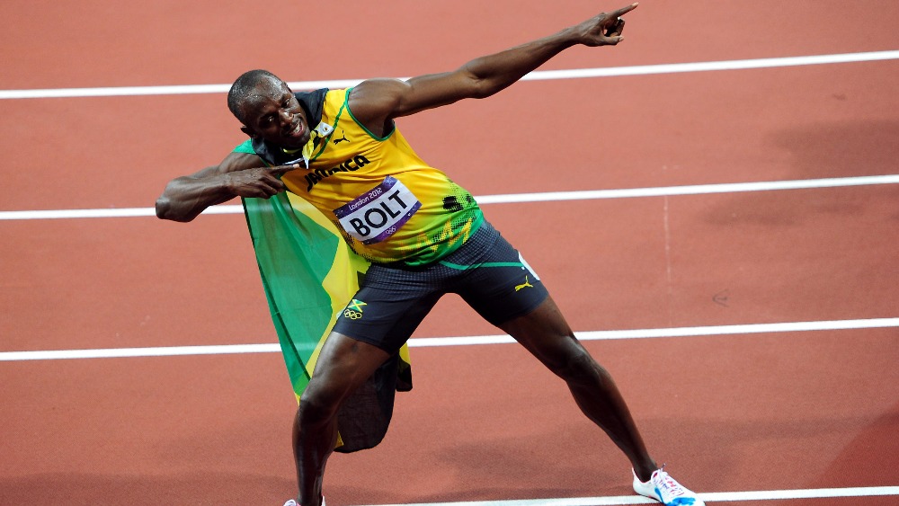 World's fastest man sets new Olympic record ITV News