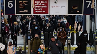 Commuters at Liverpool Street train station, London, as Plan B measures are lifted in England. Face coverings will no longer be mandatory in any setting, and the NHS Covid Pass will no longer be compulsory for entry into nightclubs and other large venues. Picture date: Thursday January 27, 2022.