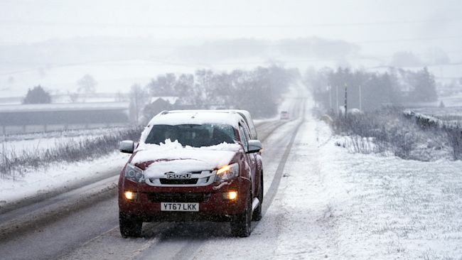 cars on snowy road