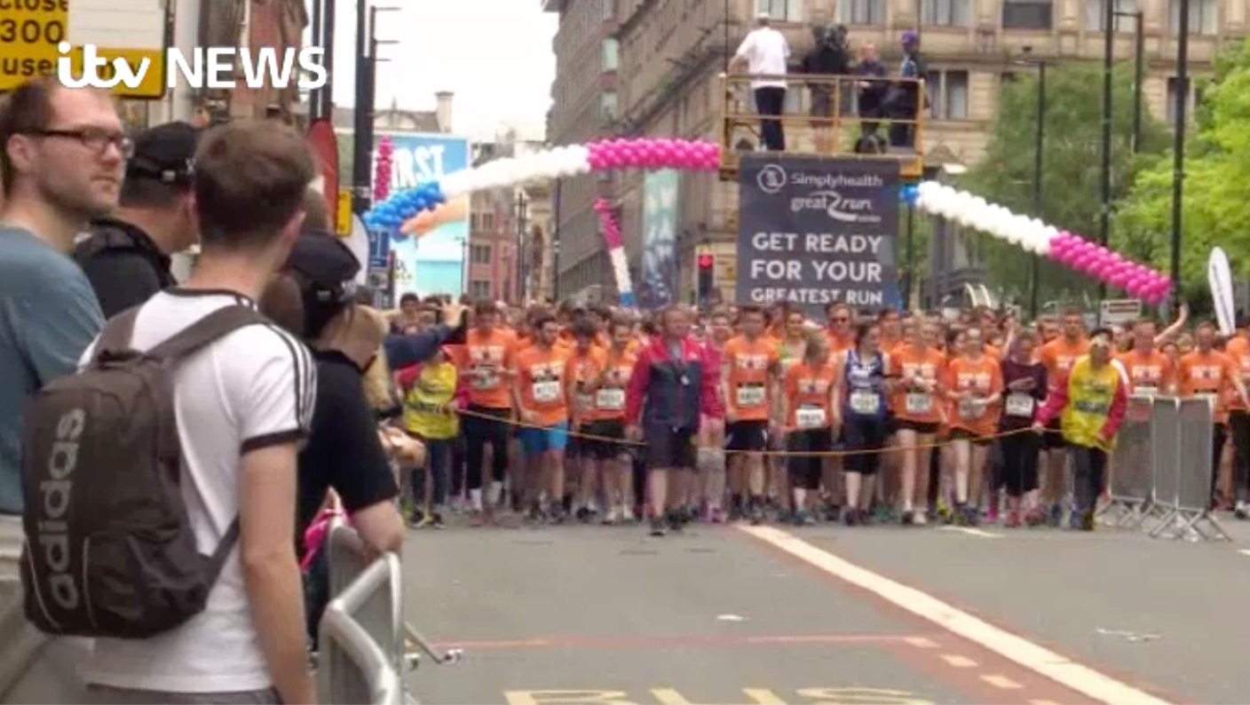 Runners and spectators fill the streets for Great Manchester Run ITV
