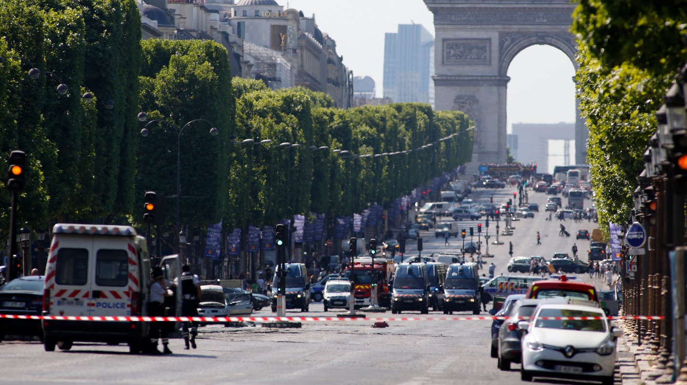 Suspected attacker 'downed' after driving into police car in Paris ...