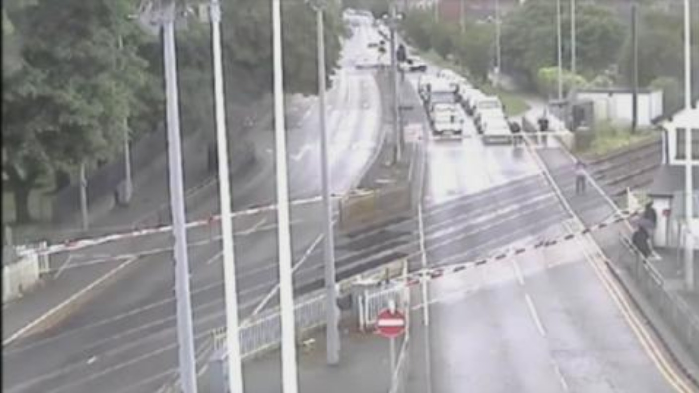 Police appeal to identify man who risked life on level crossing | ITV ...
