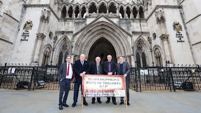 Treloars blood infection scandal survivors at the Royal Courts in London.
Des Collins (lawyer ) is the man in the middle holding the document
Gary Webster left
Steve Nicholls second from left
Richard Warwick to the right of Des
Ade Goodyear far right
Credit: Bell Yard