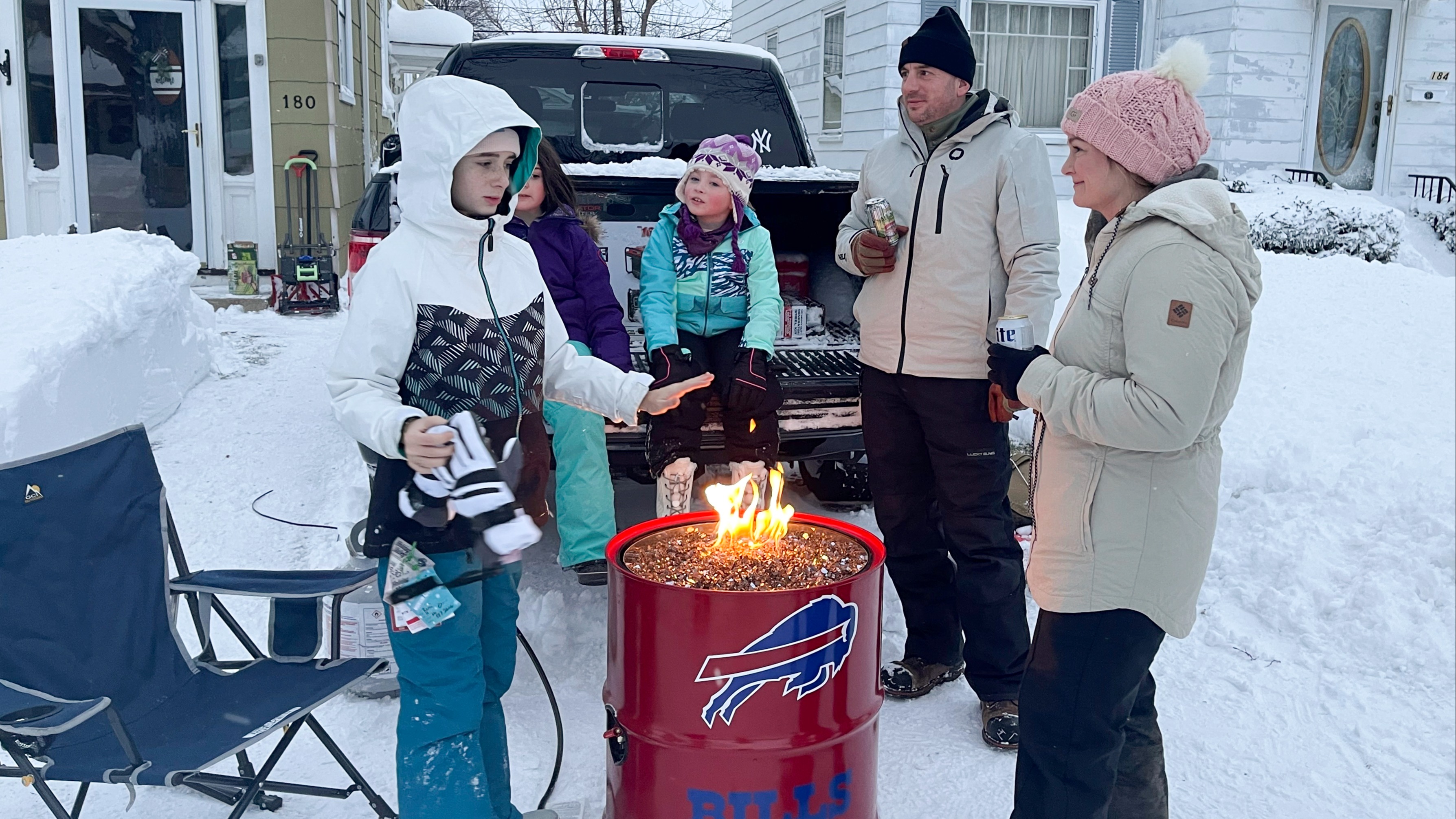 US bomb cyclone: Buffalo Bills players find their cars buried in