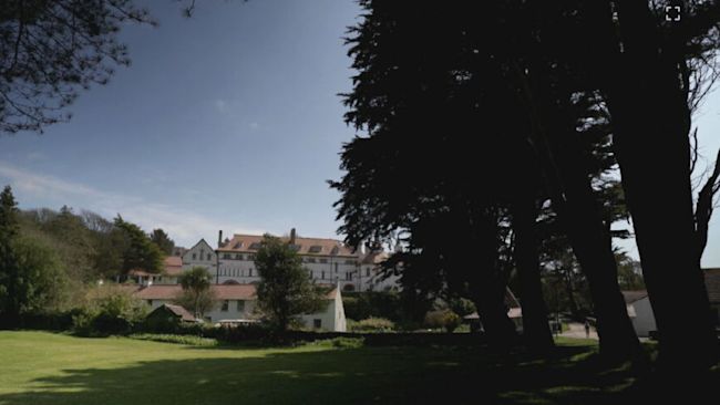 Caldey Island off Pembrokeshire is host to Caldey Abbey.