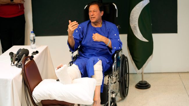 Former Pakistani Prime Minister Imran Khan speaks during a news conference in Shaukat Khanum hospital, where is being treated for a gunshot wound in Lahore, Pakistan, Friday, Nov. 4, 2022. Khan's protest march and rallies were peaceful until the afternoon attack on Thursday, when a gunman opened fire at his campaign truck. The shooting has raised concerns about growing political instability in Pakistan, a country with a history of political violence and assassinations.(AP Photo/K.M. Chaudhry)