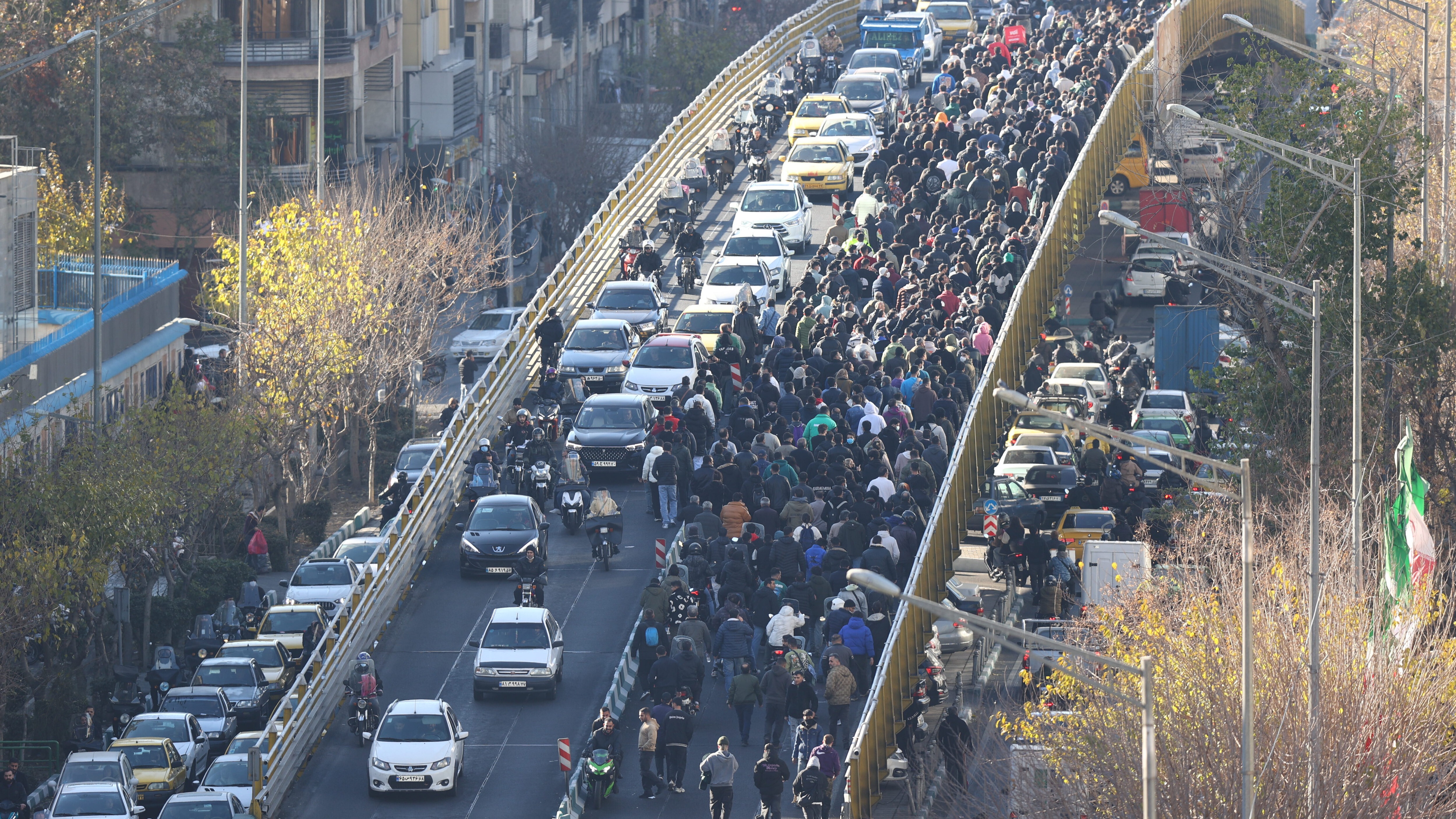 Why are there protests in Iran, and how are the UK and US involved?