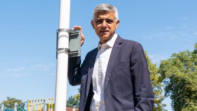 Sadiq Khan with an air quality monitoring station during a visit to Mums for Lungs community group i