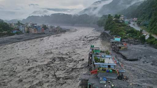 Nepal warns of possible fresh flooding as death toll climbs past 900