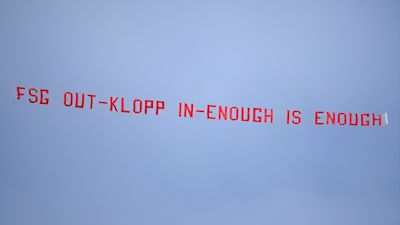 Liverpool fans fly banner over Anfield calling for owners Fenway Sports ...