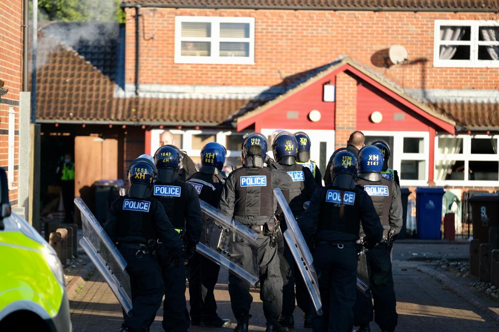 Two charged after elderly couple caught up in rooftop stand-off in ...