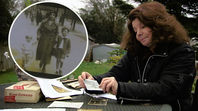 women looking at old photos