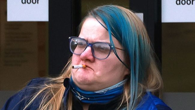 Deanne Franklin with a cigarette outside court 