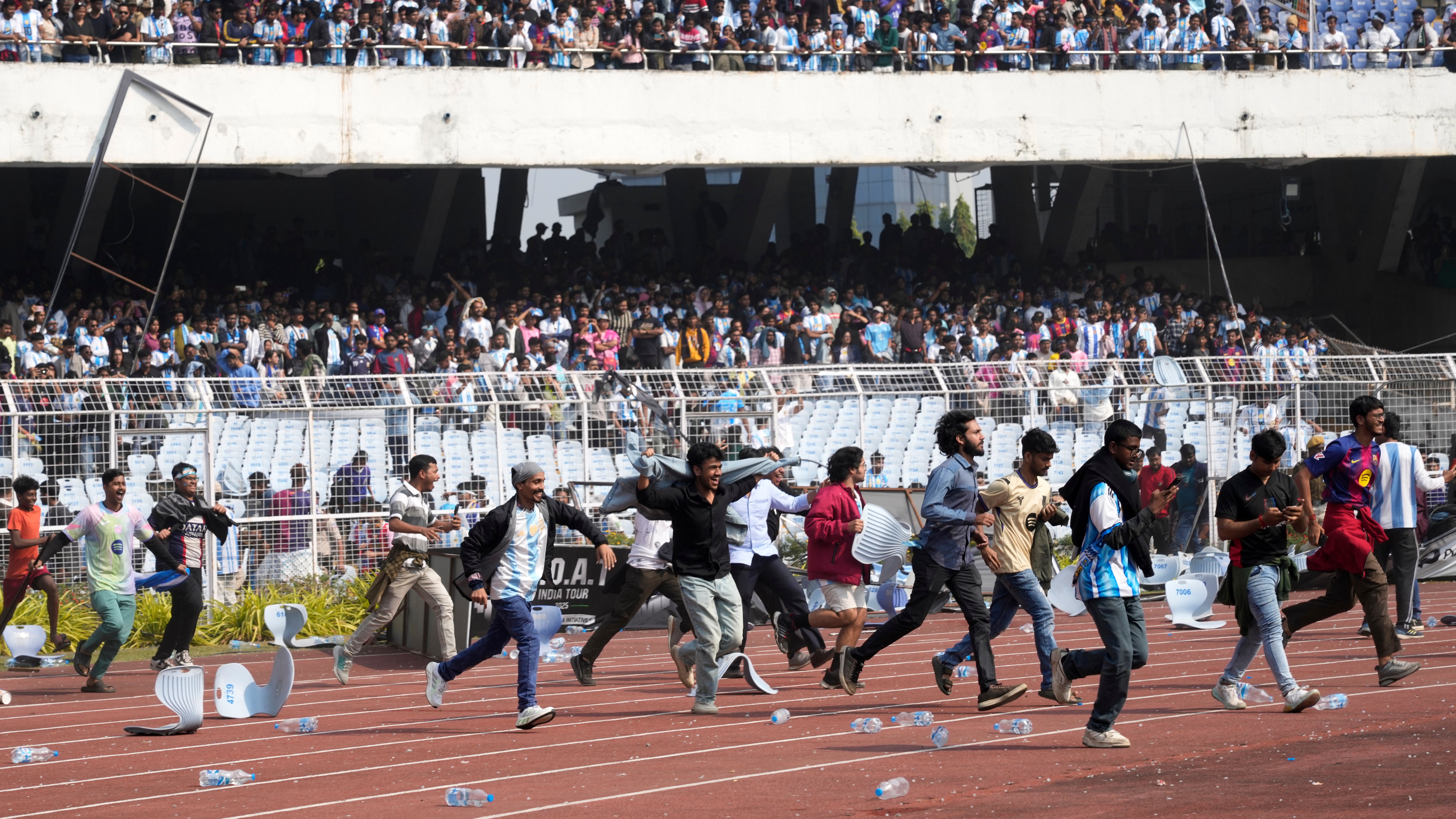 Messi's India tour sees chaotic first day as angry fans hurl items onto pitch