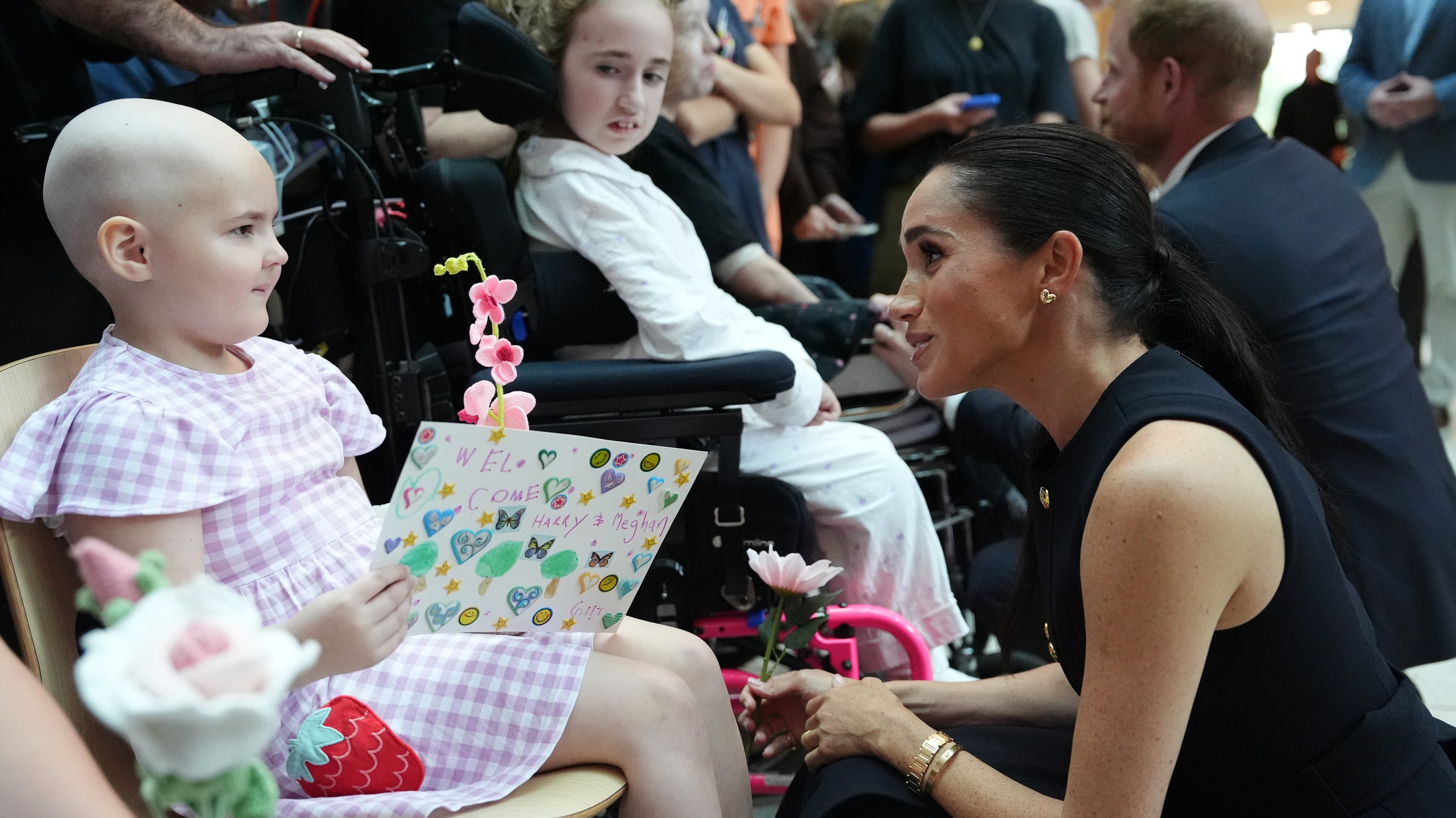 Harry and Meghan begin Australia tour with visit to children's hospital | ITV News