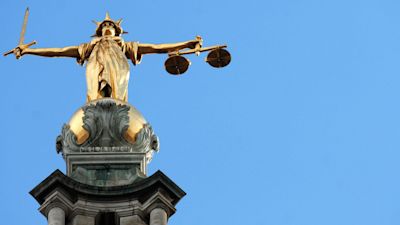 030422 Old Bailiey - View of the gold statue of the figure of justice, holding scales and a sword