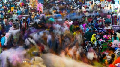 People move through a market in Mumbai, India, Saturday, Nov. 12, 2022. The world's population is projected to hit an estimated 8 billion people on Tuesday, Nov. 15, according to a United Nations projection. (AP Photo/Rajanish Kakade)