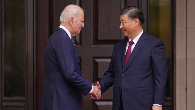 Joe Biden and Xi Jinping shake hands at the Filoli Estate in Woodside, California.