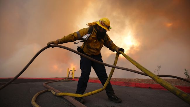 More than 4,000 firefighters were assigned to the fire .