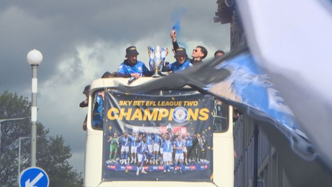 Stockport County paraded the trophy on an open top bus parade through the town