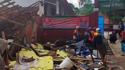 rescuers inspect a school damaged by earthquake in Cianjur, West Java, Indonesia,