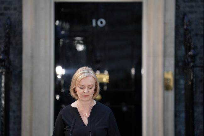 Prime minister Liz Truss reads a statement outside 10 Downing Street.