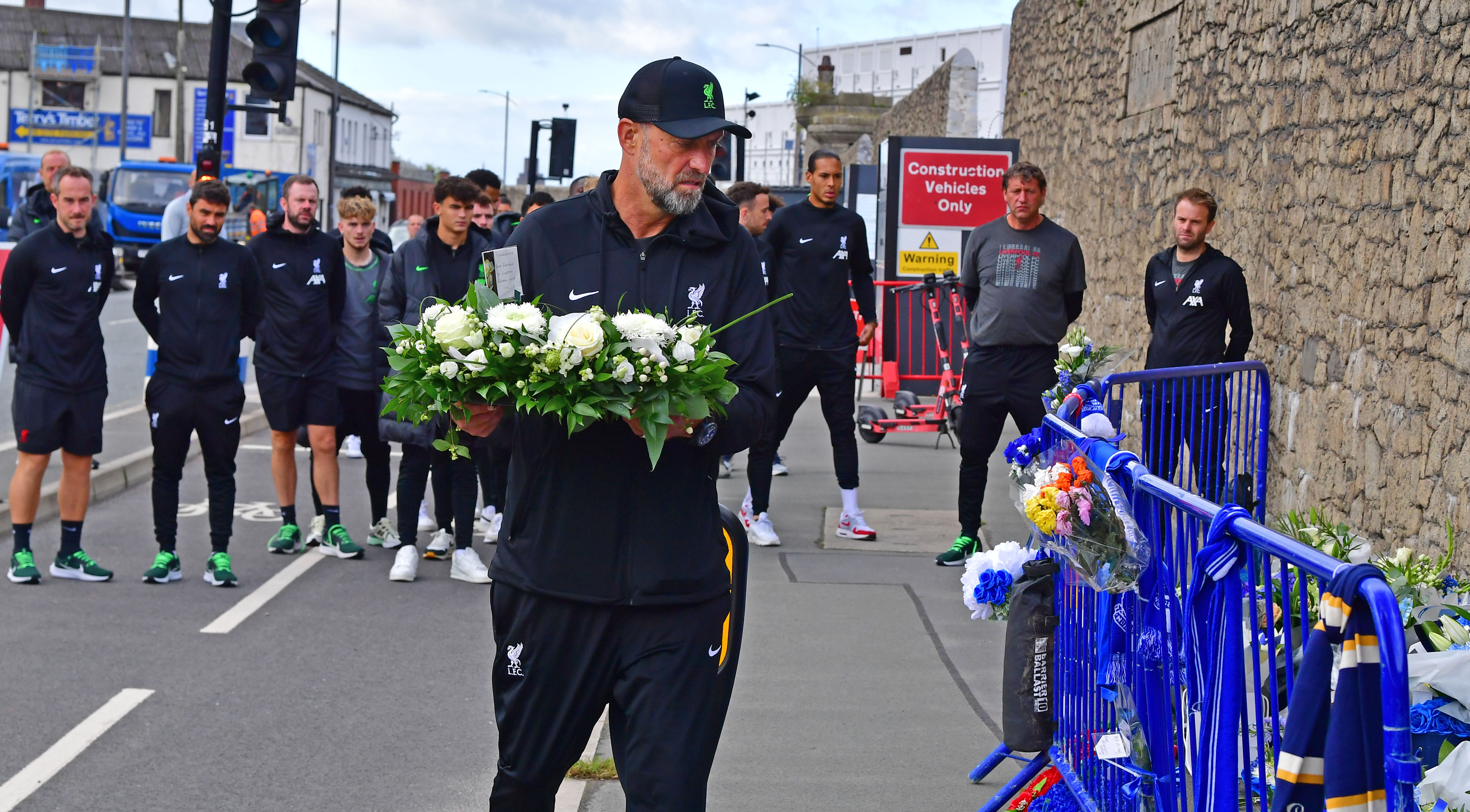 Jurgen Klopp and team lay flowers at Everton's new stadium after  construction worker's death | ITV News Granada