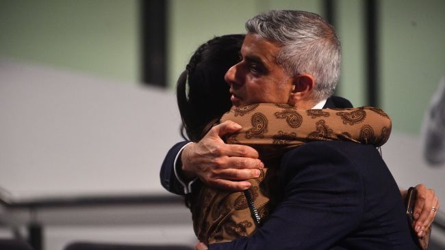 Labour's Sadiq Khan is hugged by one of his daughters after he was declared as the next Mayor of London at City Hall, London. Picture date: Saturday May 8, 2021.
