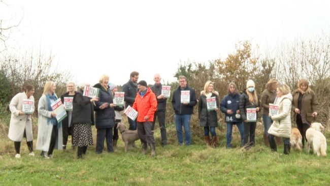 Friends of the Green Belt are protesting near the proposed grounds